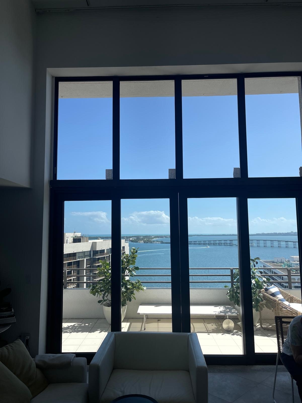 2 sliding glass doors living room by the water