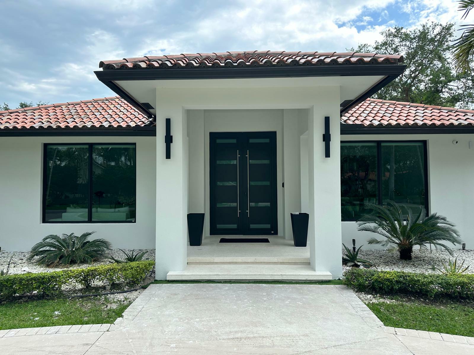 bronze front main door with metal holder